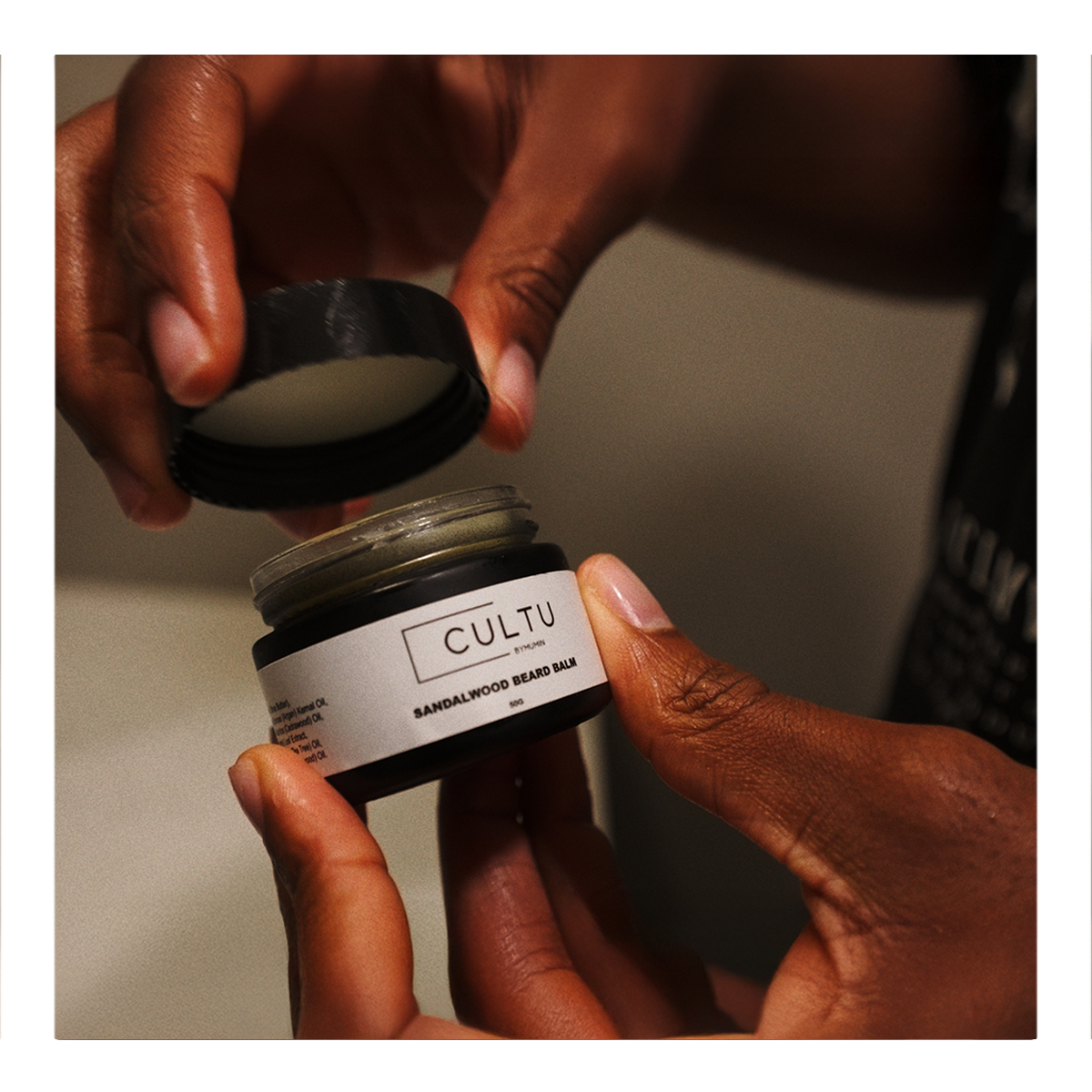 Cultu Sandalwood Beard Balm being opened